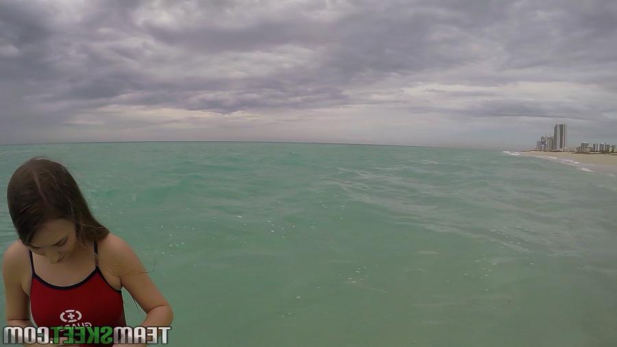 16P Teen babe Kimber Lee flashing large natural tits in the ocean
