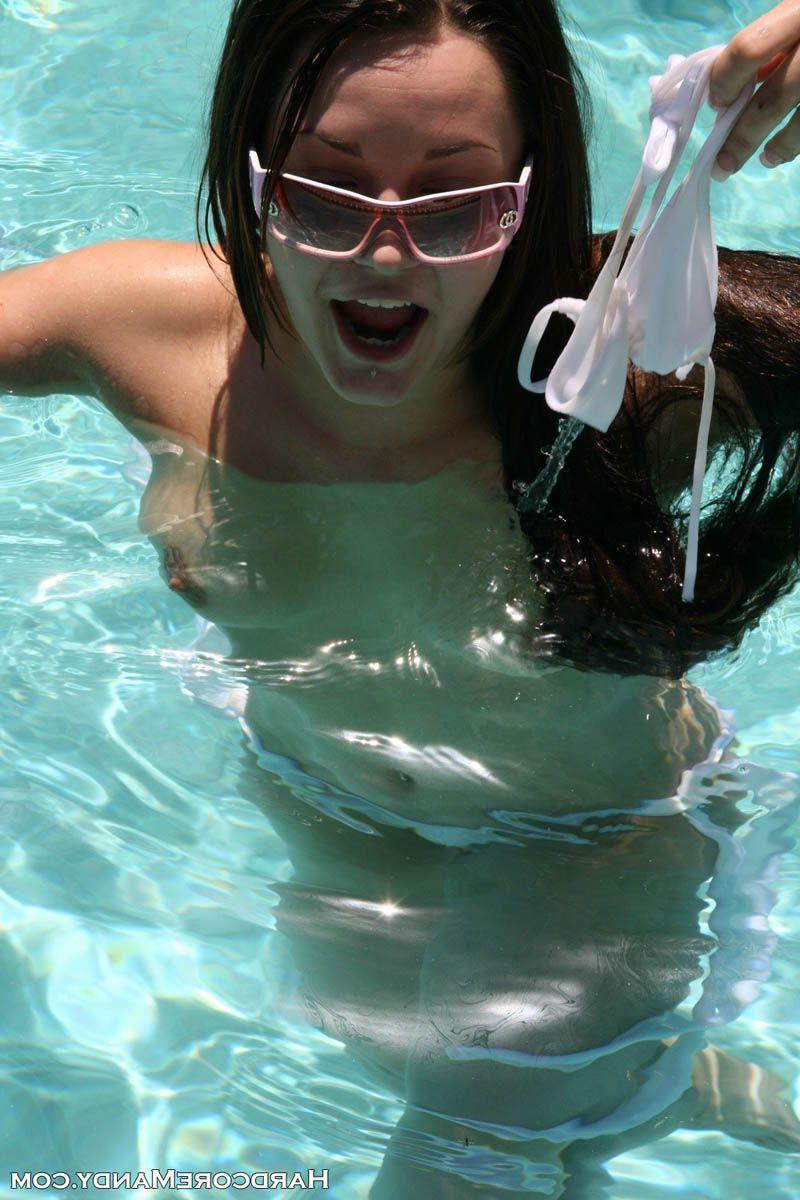 16P Pictures of Hardcore Mandy taking her top off in the pool