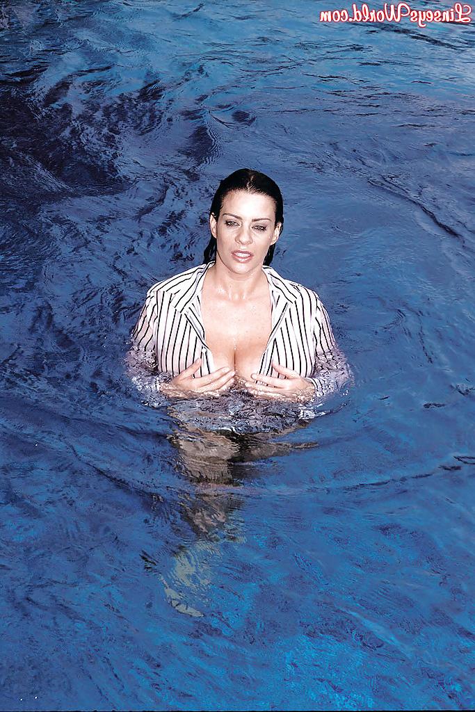 16P Hairy twat of Linsey Dawn McKenzie shown while cleaning the pool.