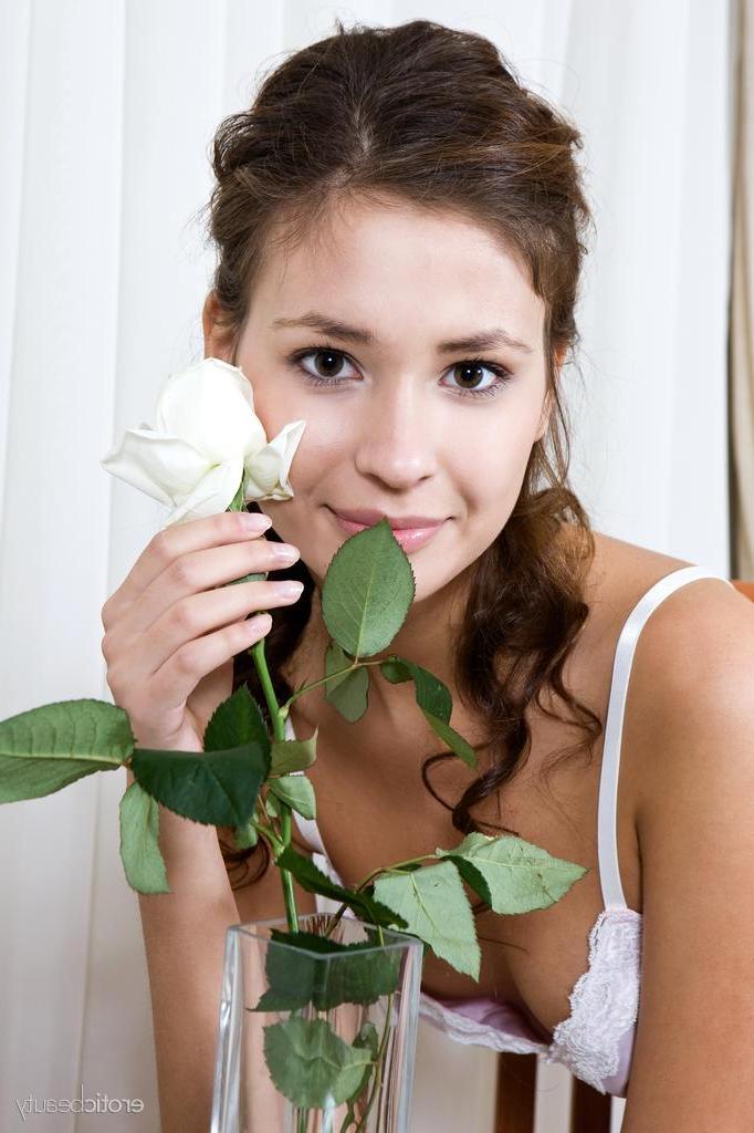 16P Stunning girl Irina J shows you her pretty flower