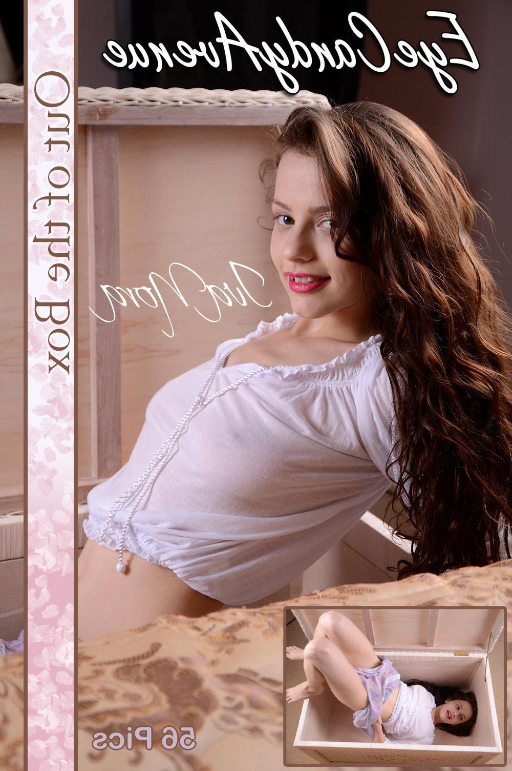 16P Beautiful brunette girl Iva Nora is inside a box getting frisky