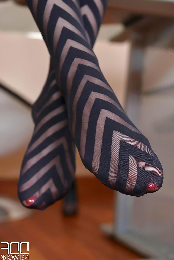 16P European chick Mira Sunset modeling sexy stockings in home office