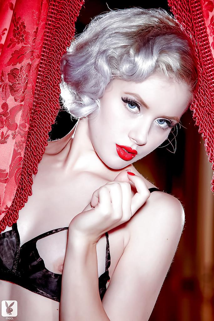 16P Kicky platinum blonde babe gets rid of her lingerie and stockings
