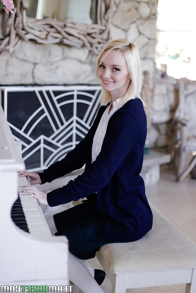 16P Innocent blonde Sammie Daniels is playing piano during undressing