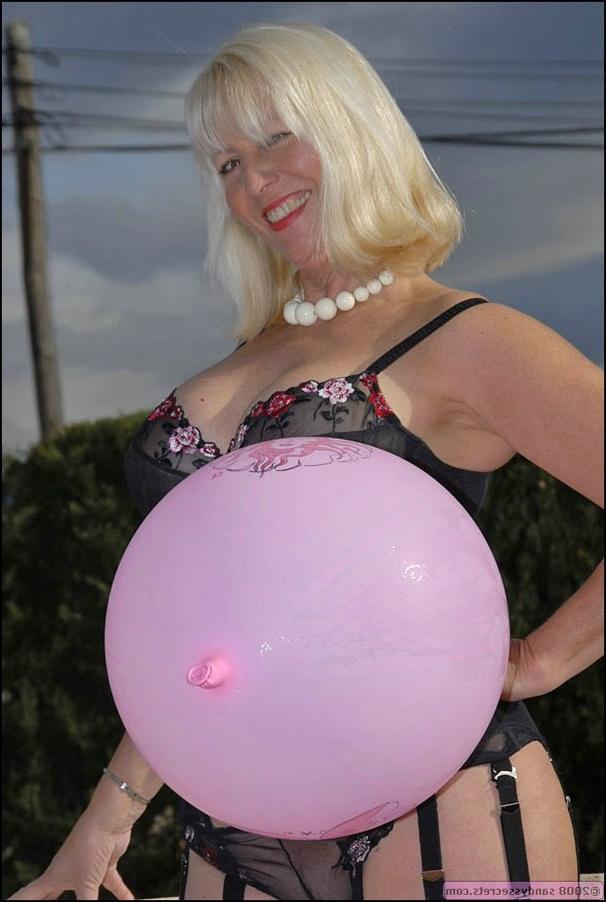 12P Lovesome mature fatty Sandy Spain strips down and plays with a balloon