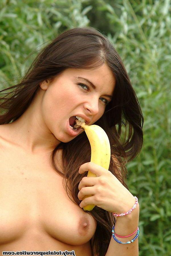 20P Pictures of teen slut Judy eating a banana with no clothes on