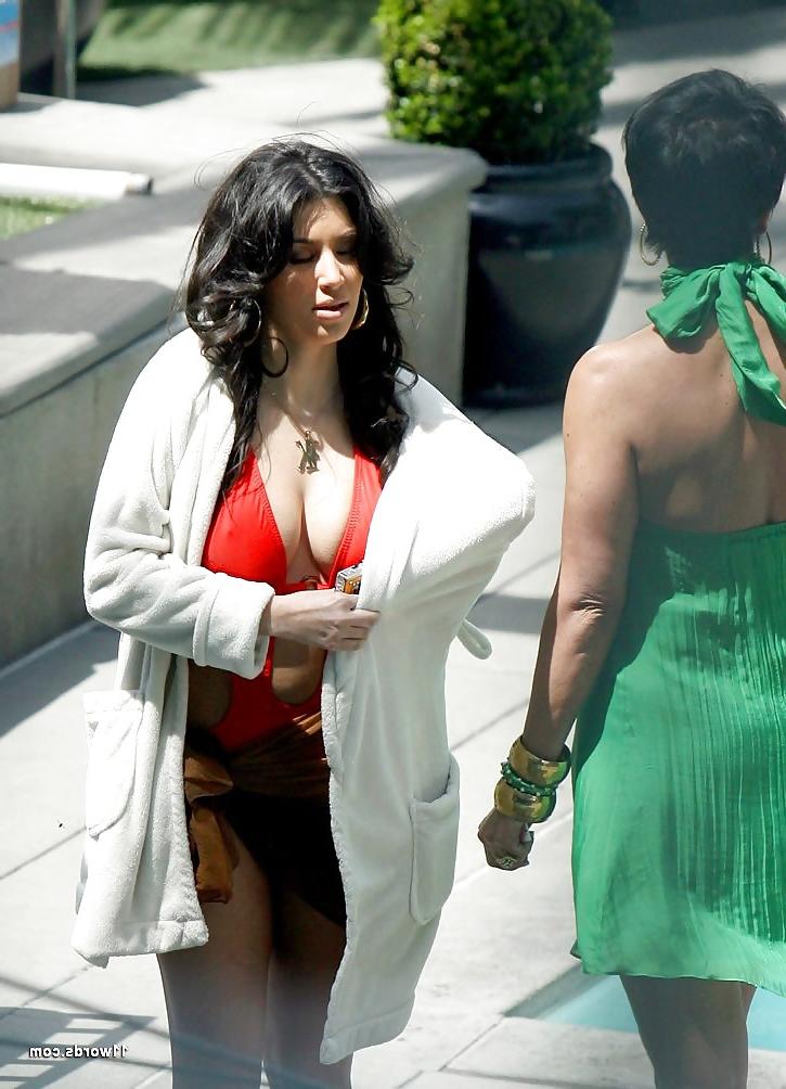12P Kim Kardashian On Swimming Pool