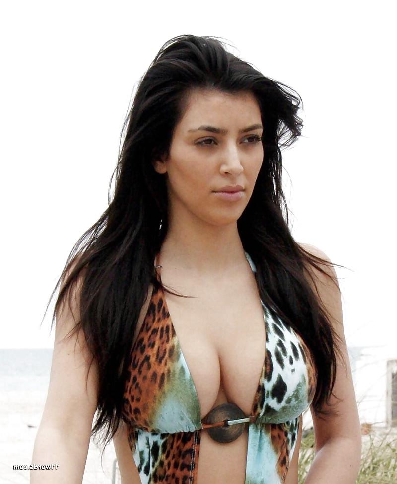 12P Kim Kardashian On Swimming Pool
