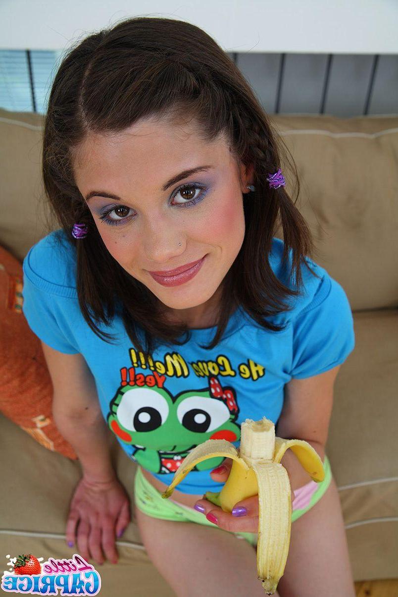 15P Pictures of teen model Little Caprice fucking herself with a banana
