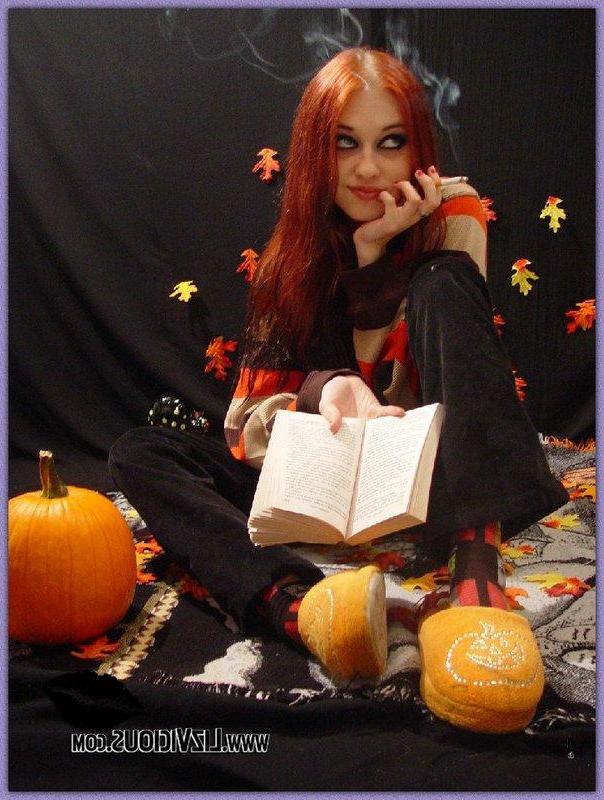 16P Liz covered in fall leaves