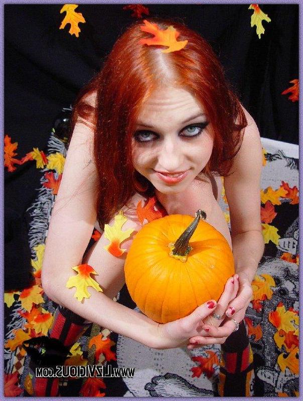 16P Liz covered in fall leaves