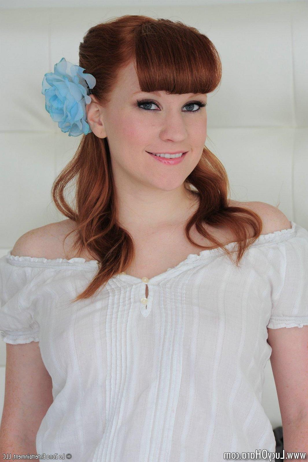 15P Pictures of Lucy Ohara toying her tight redhead pussy in bed