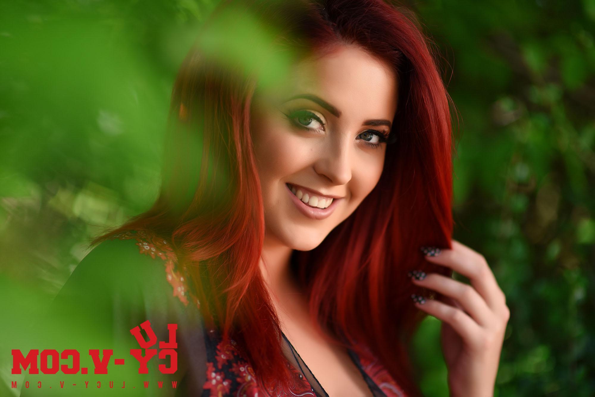 16P Beautiful redhead Lucy V shows you her big natural boobs outside
