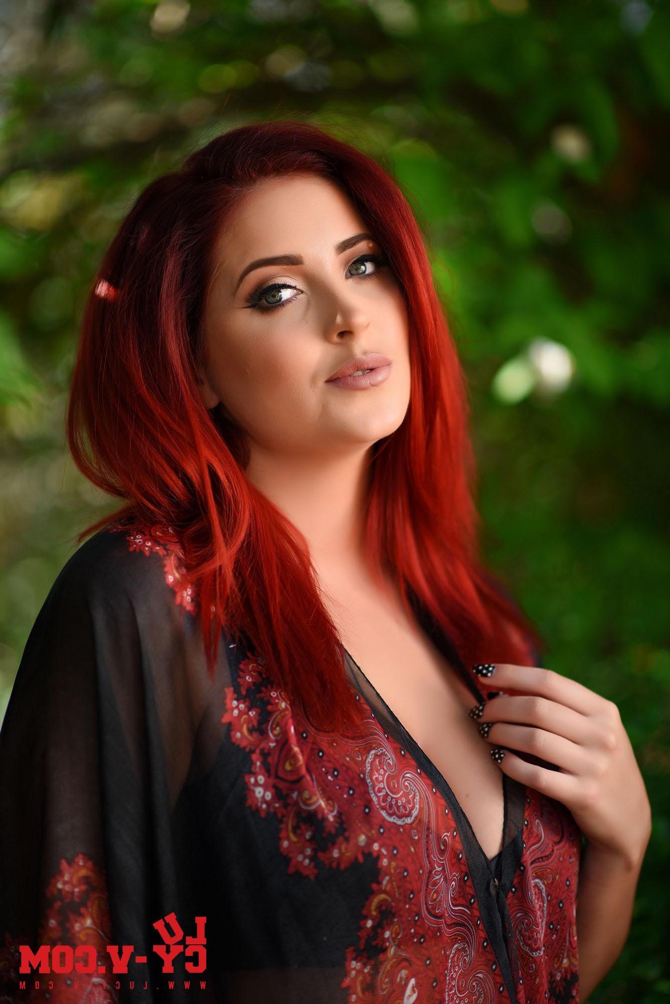 16P Beautiful redhead Lucy V shows you her big natural boobs outside