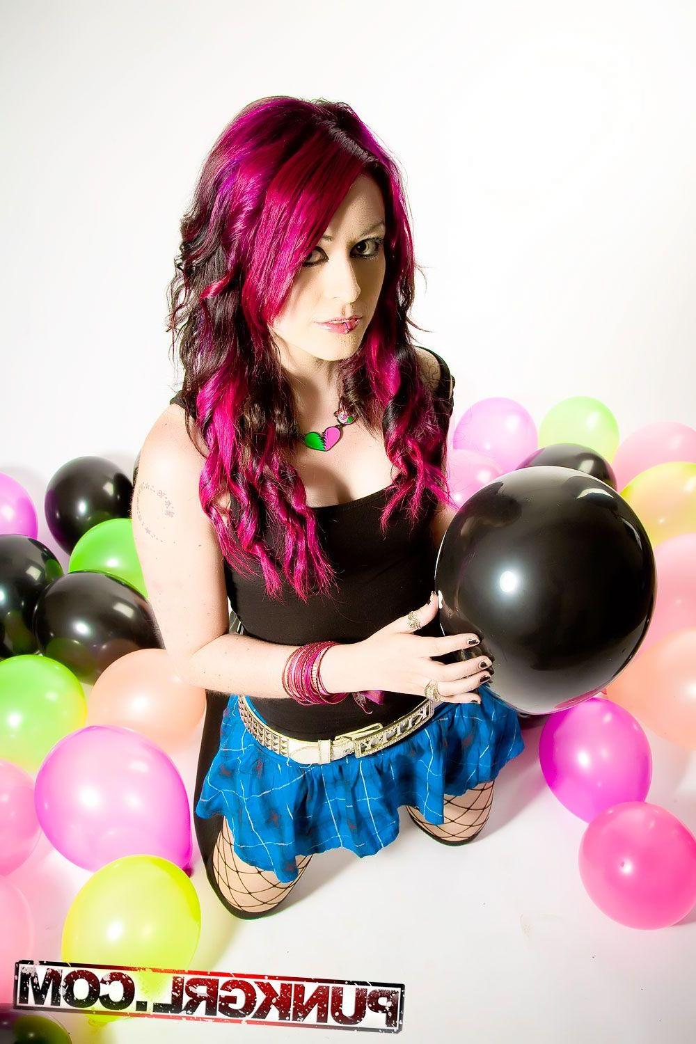 20P Pictures of Miss Kitty playing with balloons