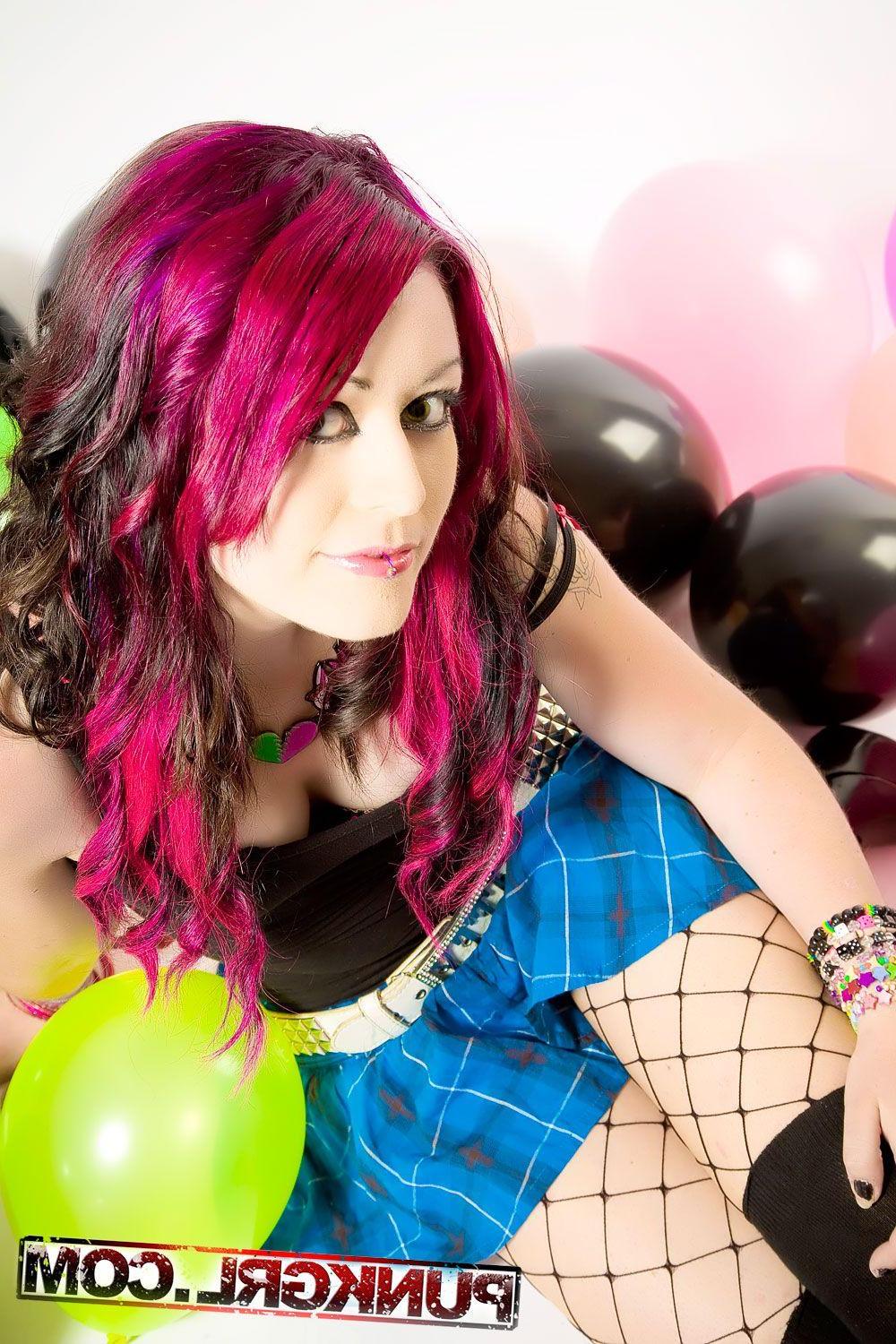 20P Pictures of Miss Kitty playing with balloons