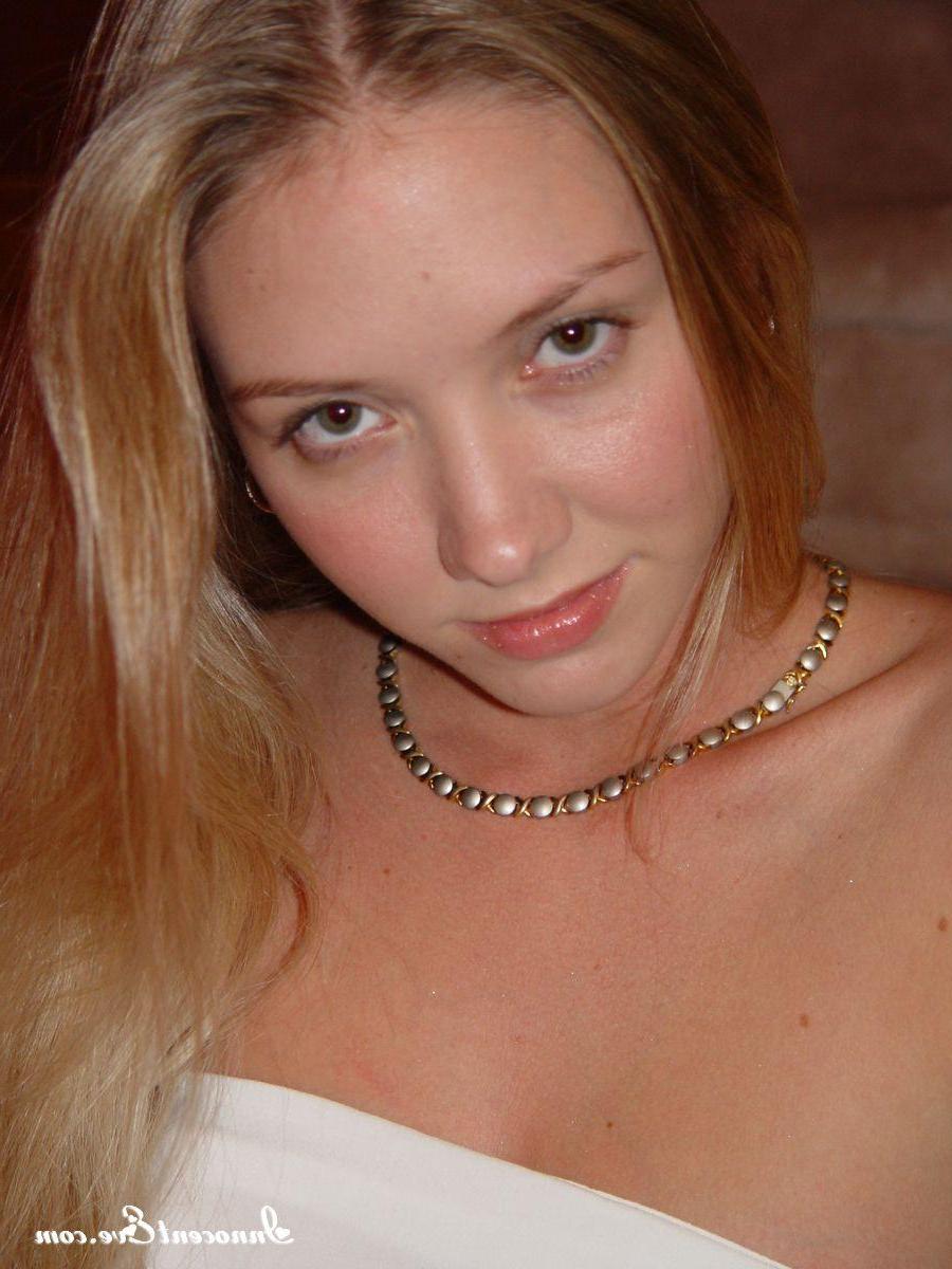 20P Pictures of Innocent Eve stripping on the stairs