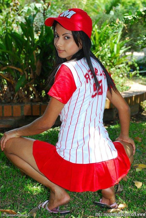 15P Pictures of latin girl Sarah totally exposed as she fuck her ass with a purple toy