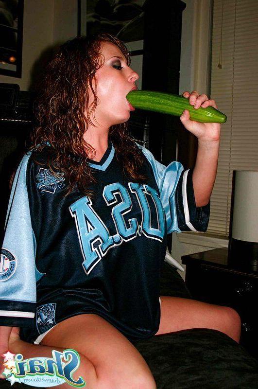 20P Pictures of Shai West fucking a giant cucumber