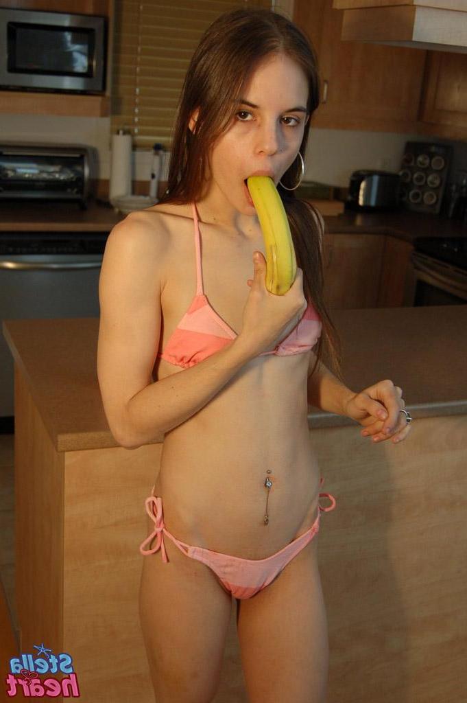 15P Pictures of Stella Heart getting kinky in the kitchen