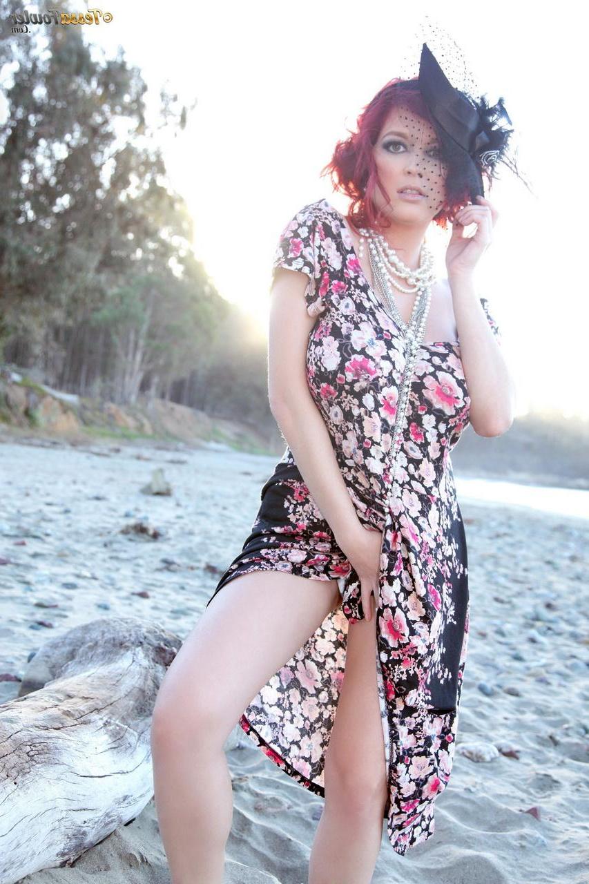 15P Busty redhead Tessa Fowler shows you her big boobs on the beach