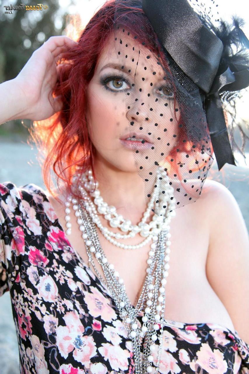 15P Busty redhead Tessa Fowler shows you her big boobs on the beach