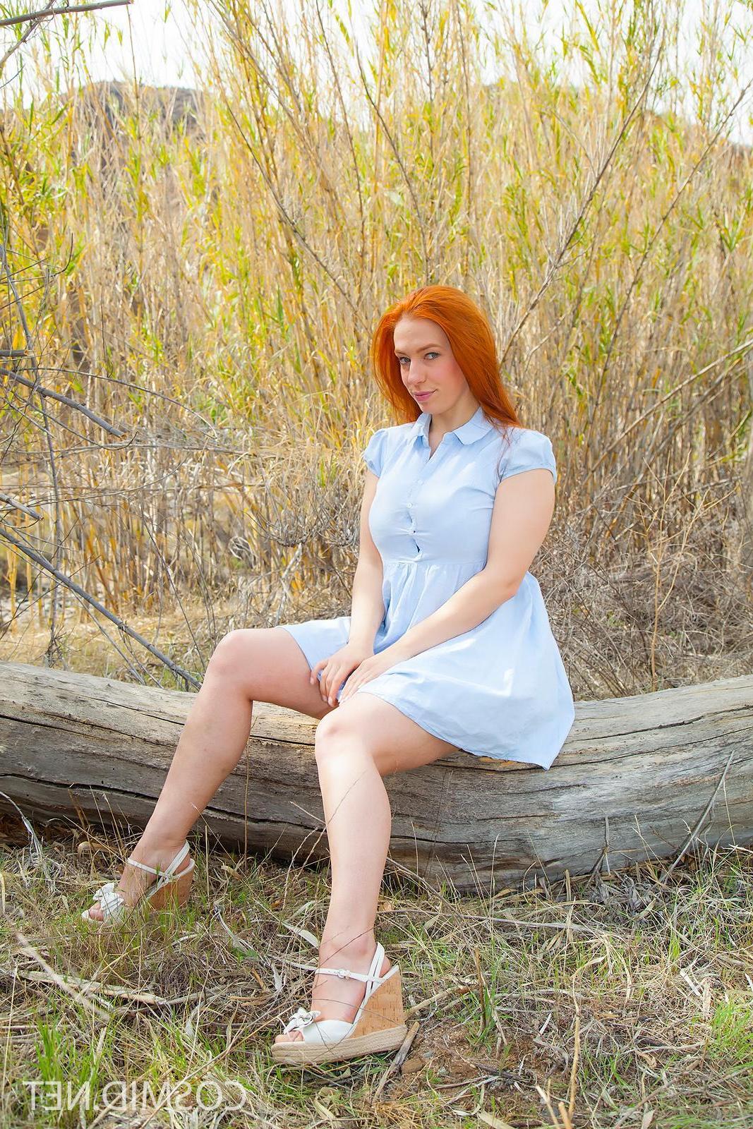 16P Busty redhead babe Titania shows her huge natural tits outside