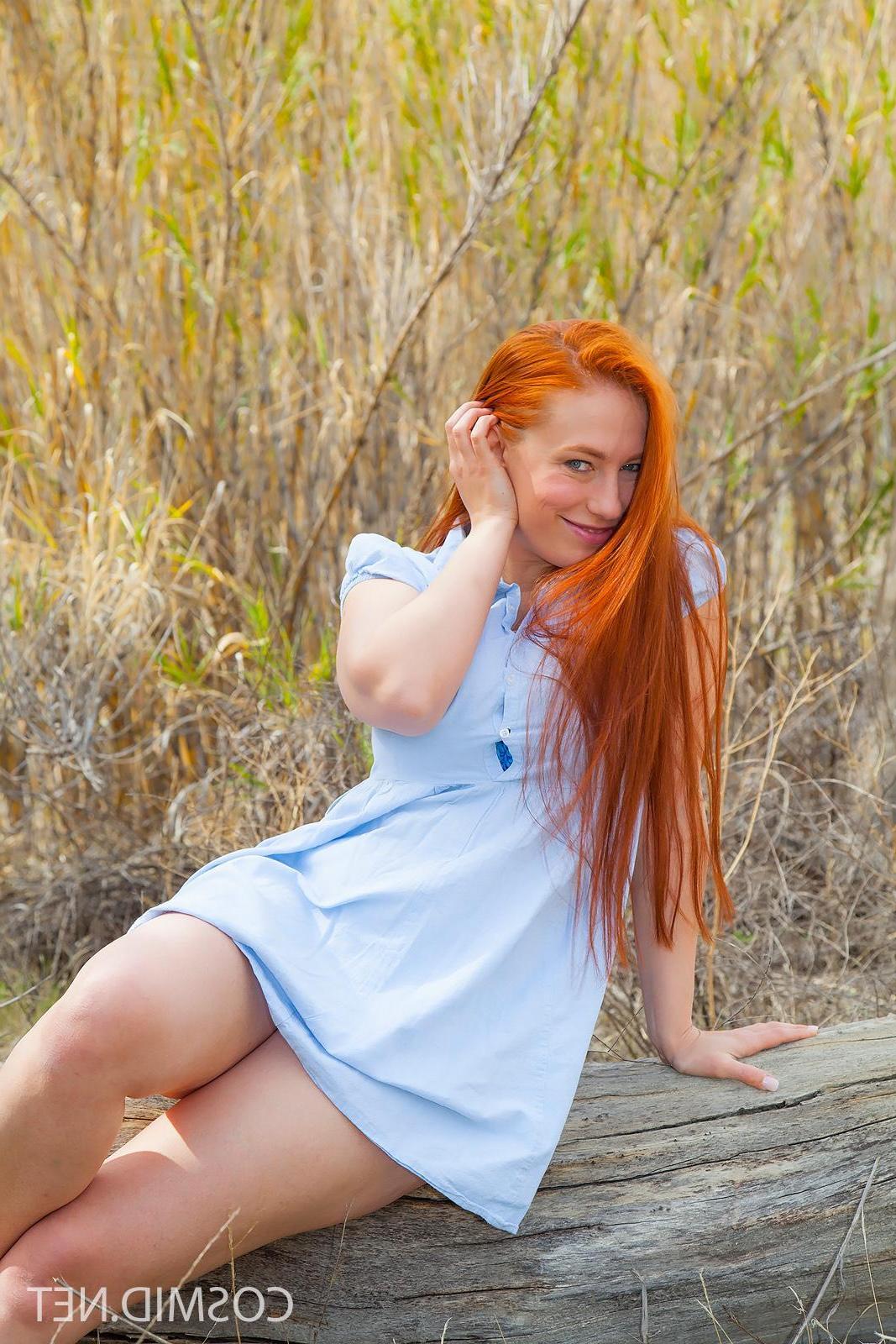 16P Busty redhead babe Titania shows her huge natural tits outside