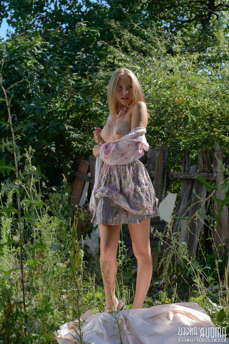 20P Blonde babe Anasteziya shows off her big natural boobs and tight bush outside