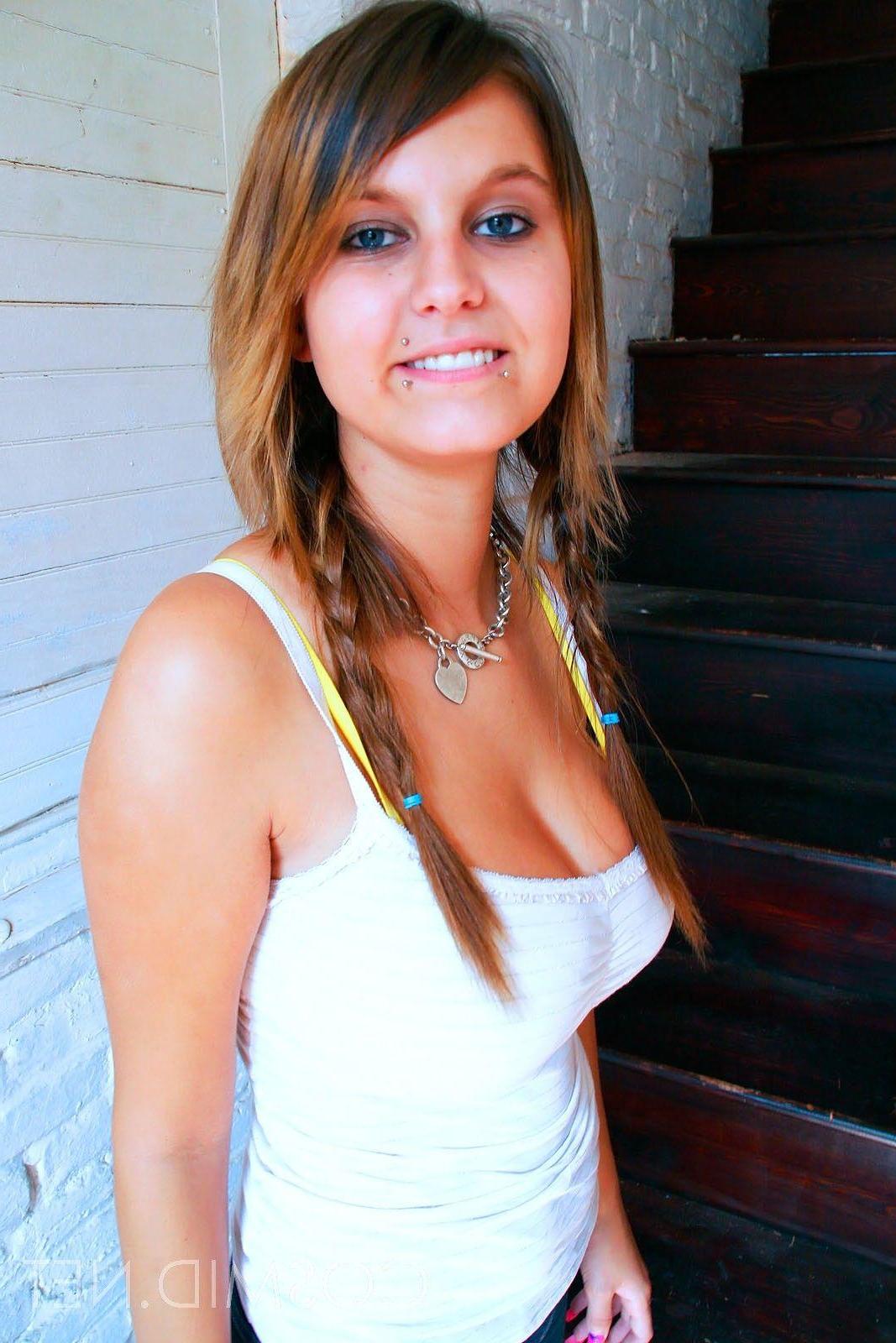 16P Pictures of a hot busty teen coed letting her big natural boobs hand out