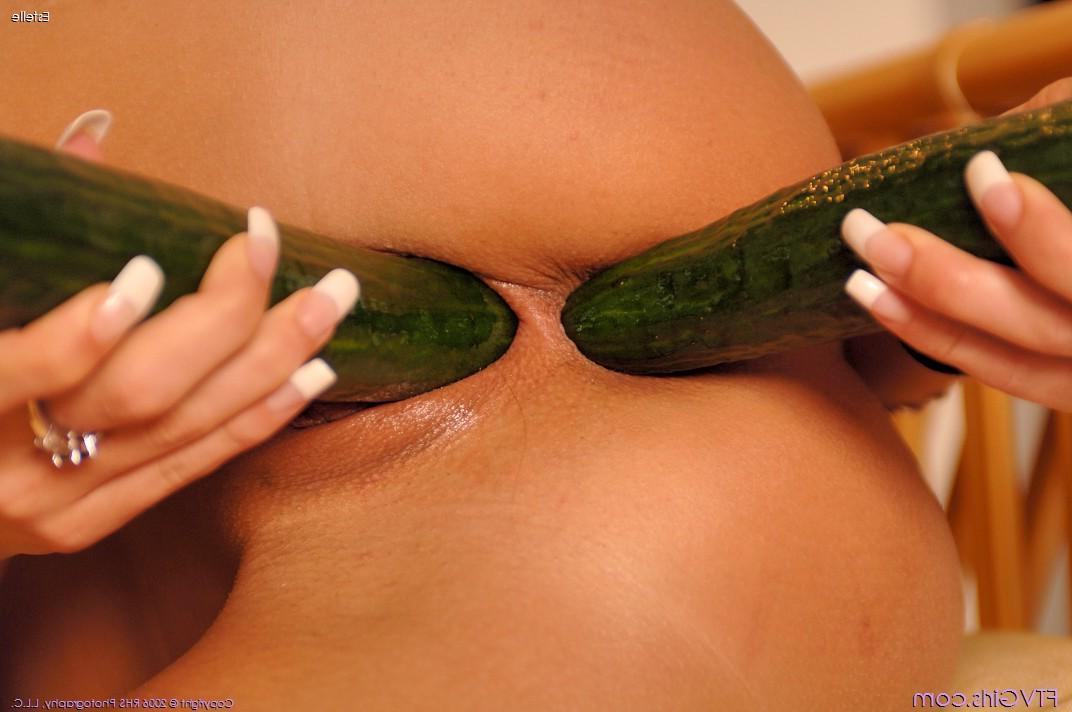 20P Pictures of a teen girl stuffing cucumbers up her holes