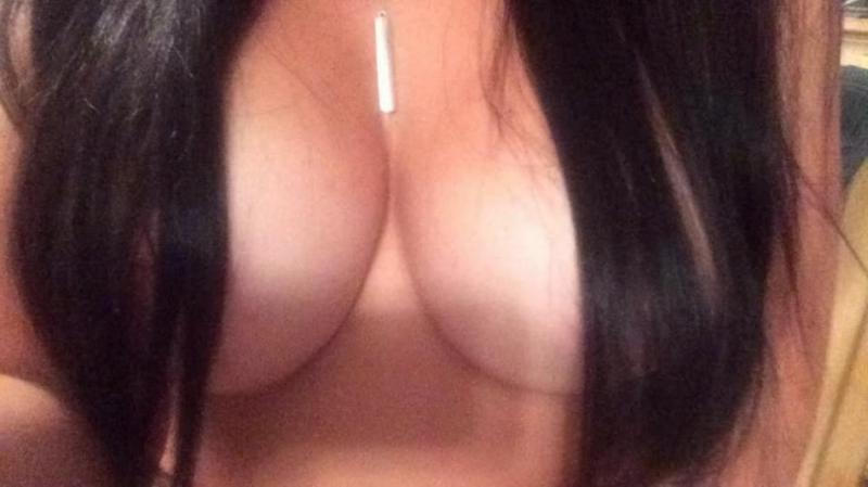 10P Hot big-tittied chick shows off her breasts and curvy body