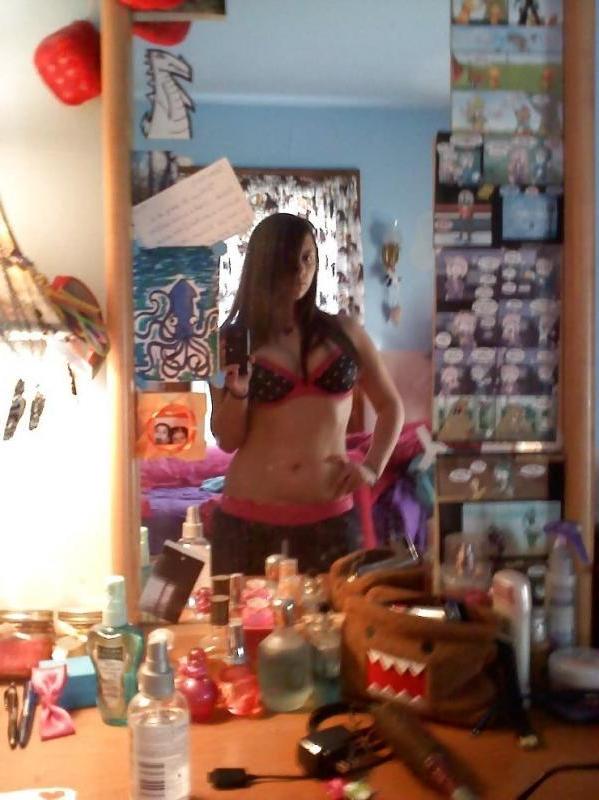10P Chick with pierced tongue shows off her fine tits