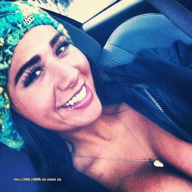 14P Busty brunette in sexy social media pictures