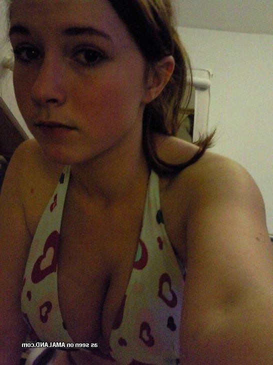 14P Pictures of an adorable busty gf posing sexy on camera