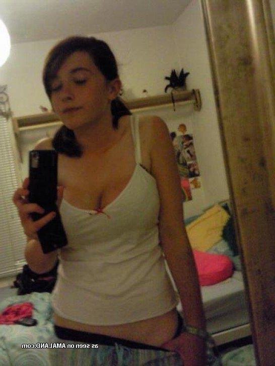14P Pictures of an adorable busty gf posing sexy on camera