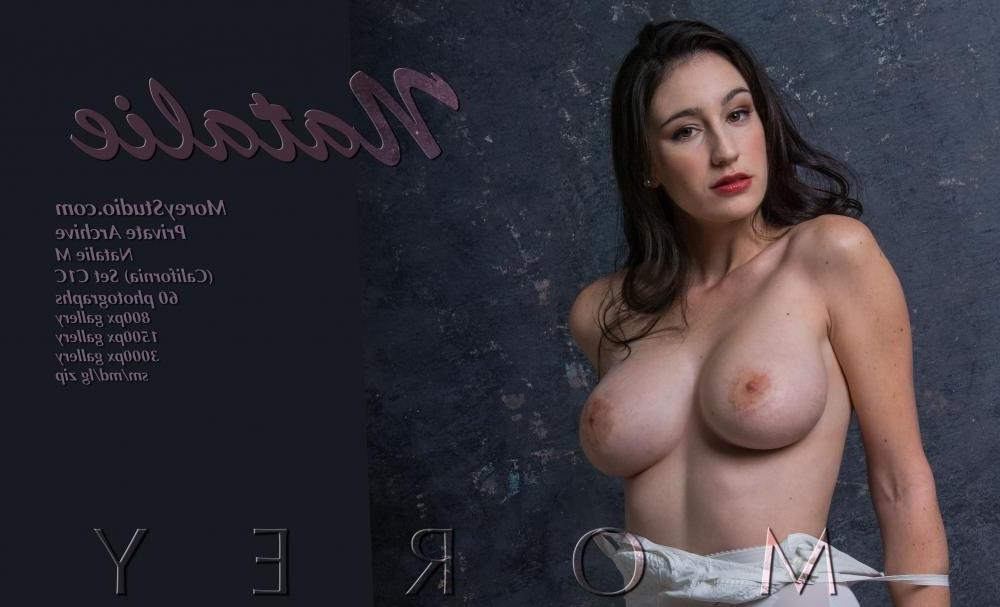 11P Busty brunette Natalie M shows you her big boobs and wet pussy in the studio