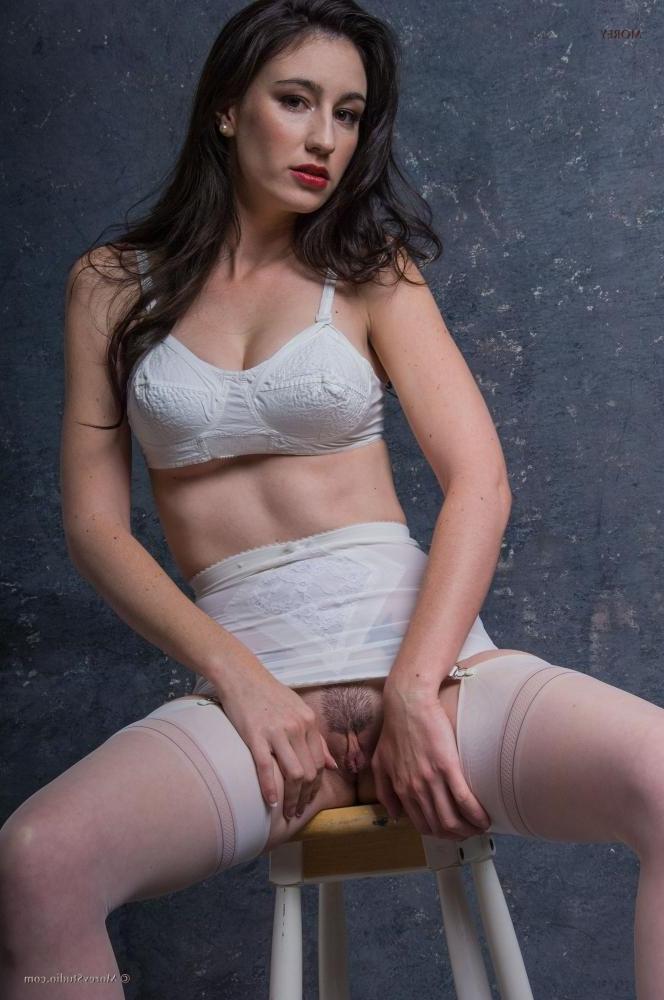 11P Busty brunette Natalie M shows you her big boobs and wet pussy in the studio