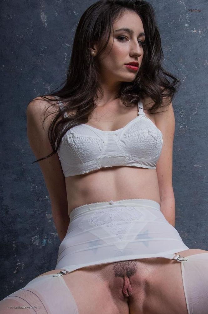 11P Busty brunette Natalie M shows you her big boobs and wet pussy in the studio