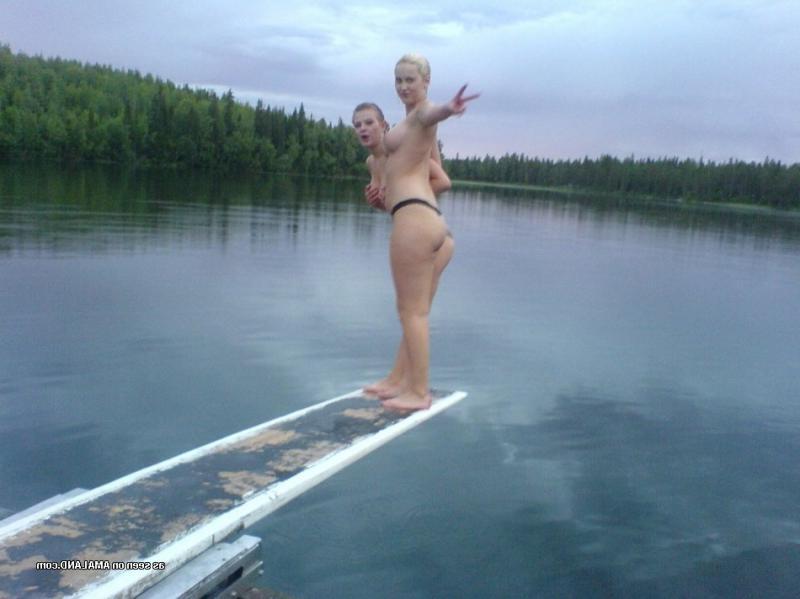 15P Pictures of two naughty blonde girlfriends going for a topless swim