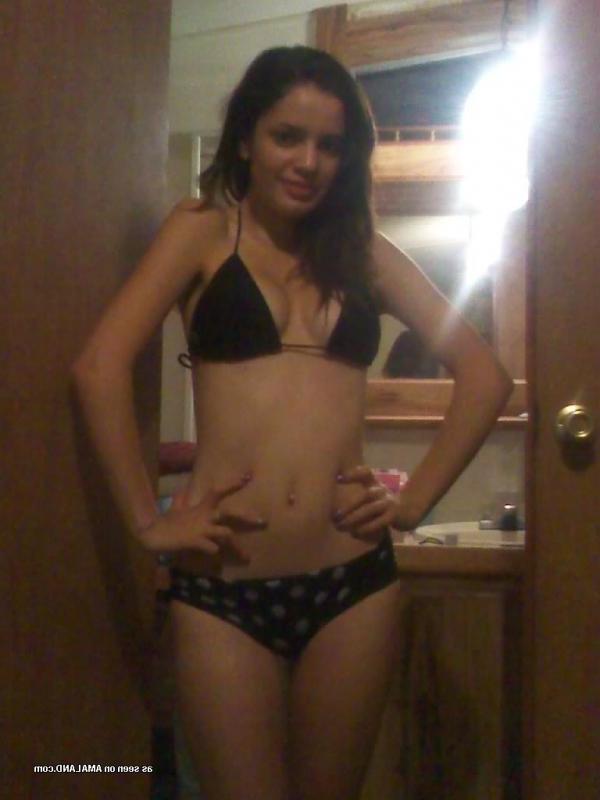 14P Gallery of a sexy Latina chick posing in bikinis