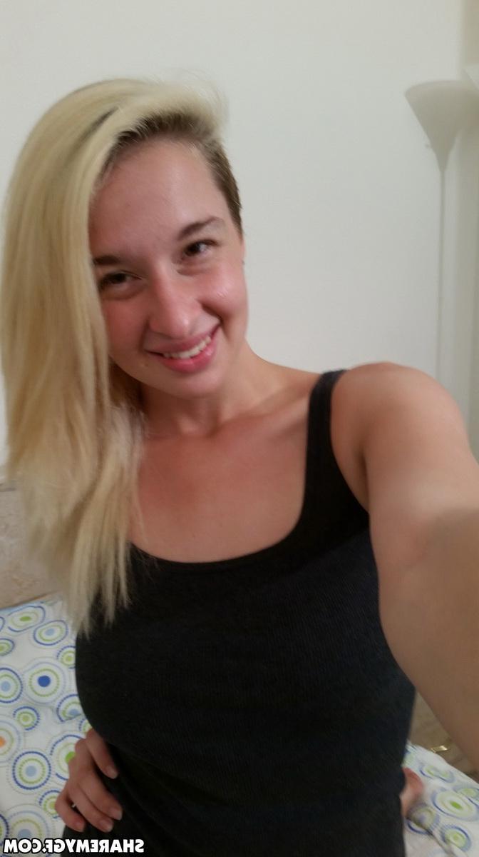 12P Blonde girlfriend shows off her big natural tits as she takes selfshot pictures for you