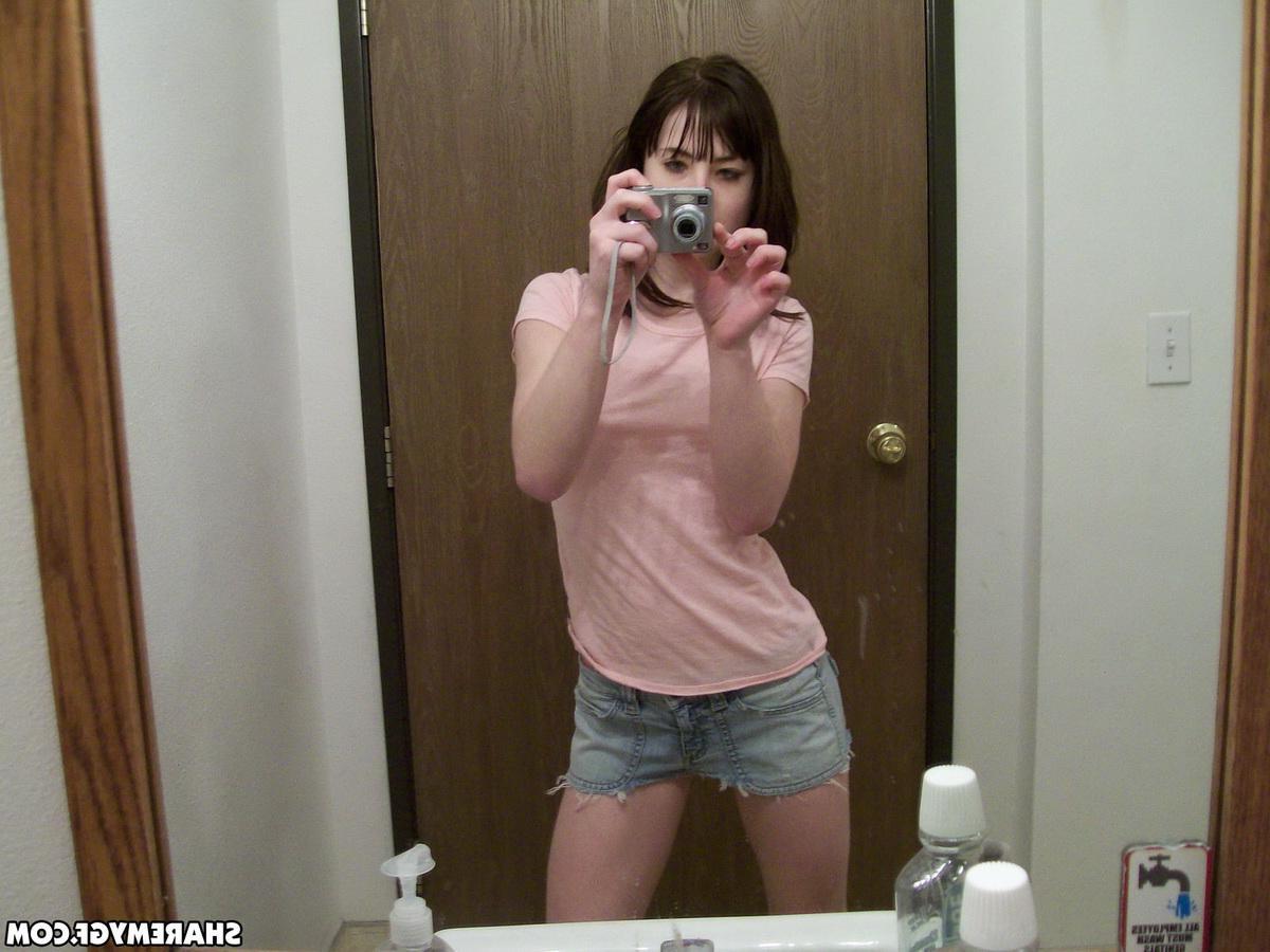 12P Perky girlfriend takes selfshot pictures in the mirror of her tits and tight round ass