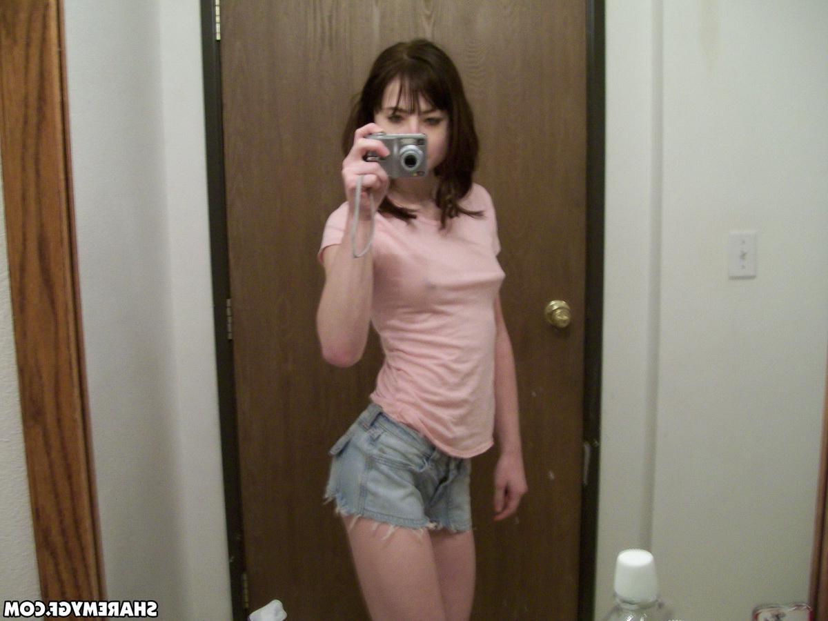 12P Perky girlfriend takes selfshot pictures in the mirror of her tits and tight round ass
