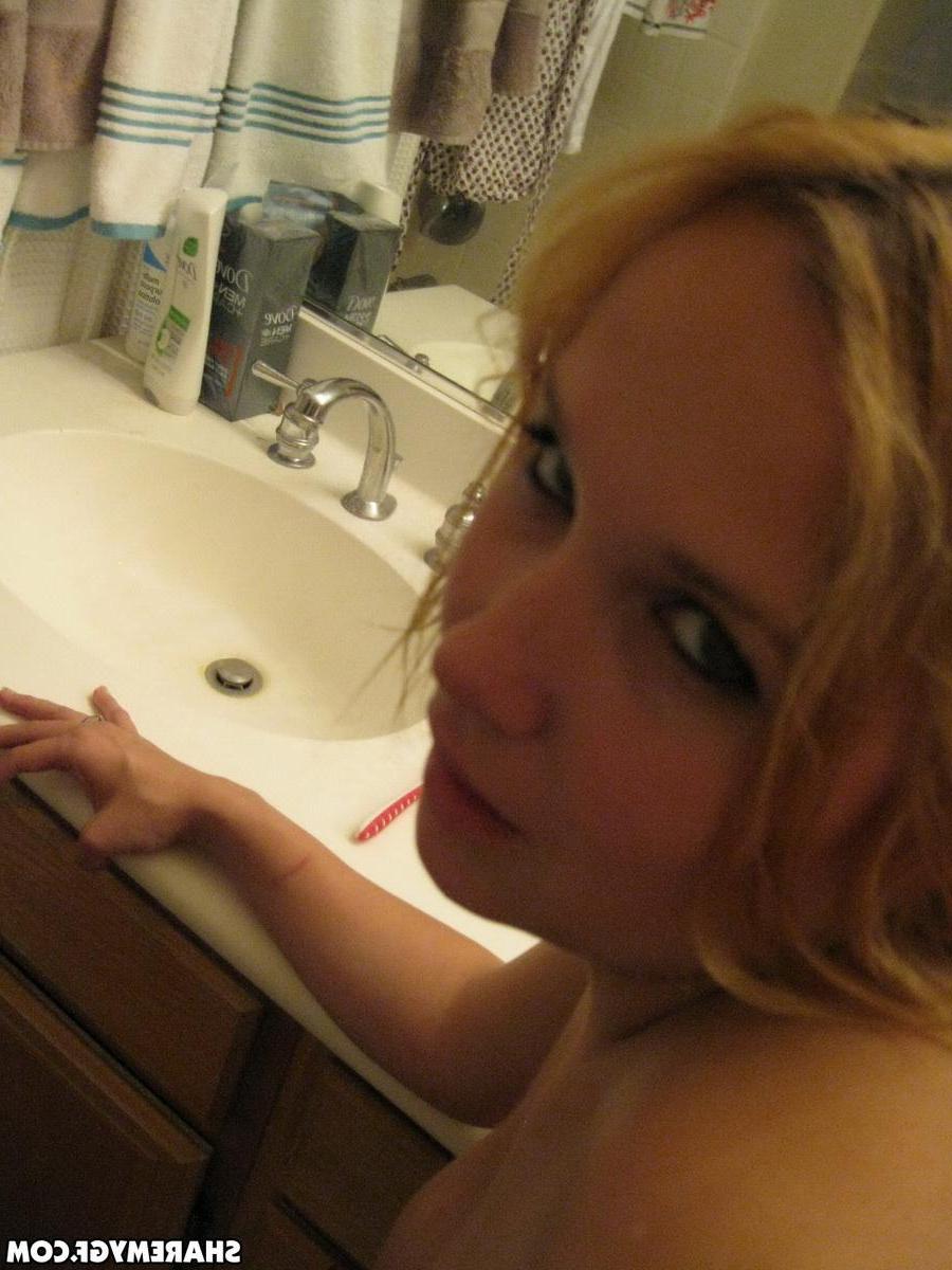 12P Busty blonde girlfriend takes selfshot pictures of her huge natural tits