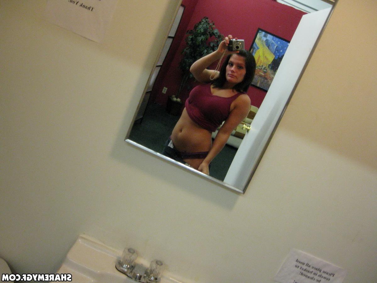 12P Big breasted girlfriend takes selfshot pictures of her huge tits