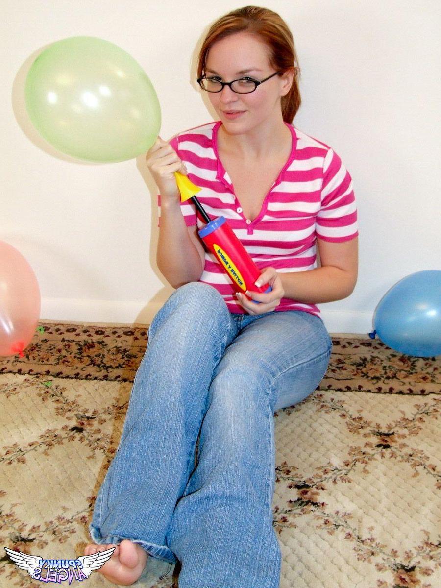 20P Pictures of a cute teen in glasses and balloons