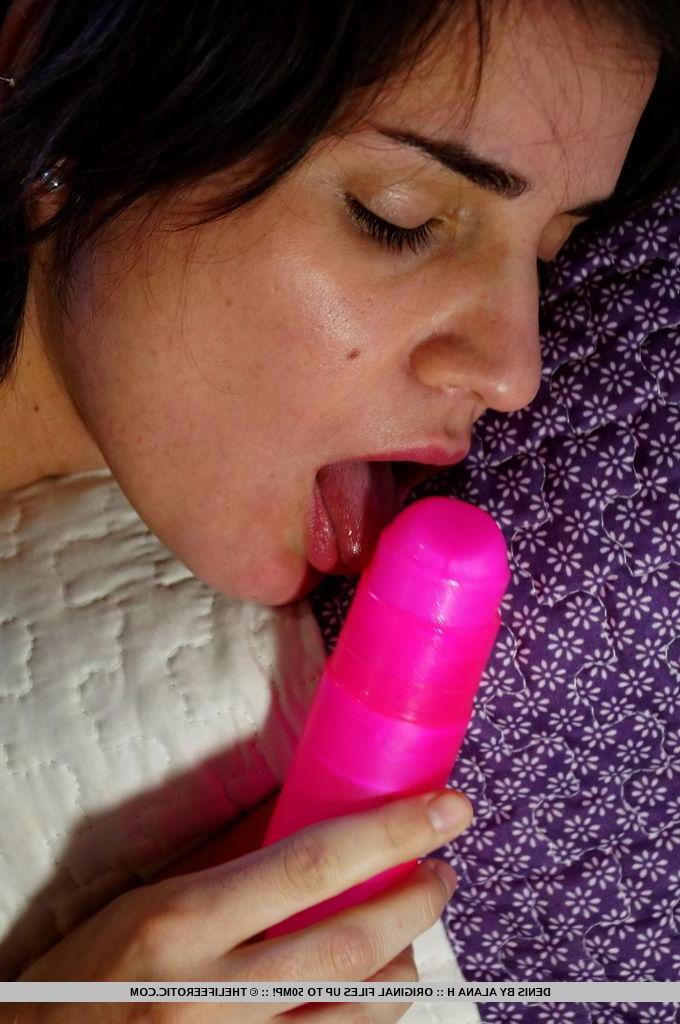 16P Brunette girl Denis pleasures her pussy with a pink dildo in bed