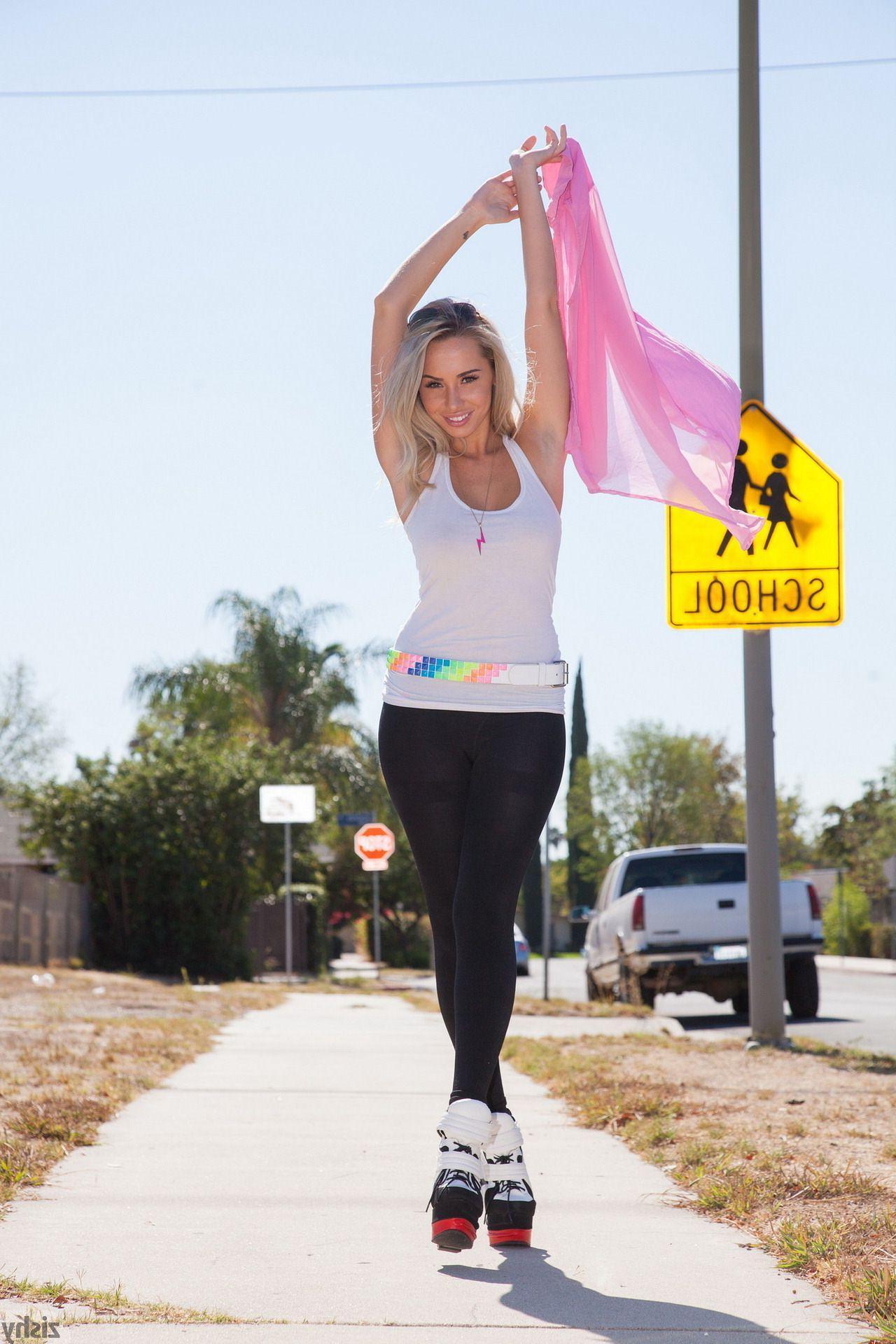 12P Blonde hottie Claudia teases in her sexy tight pants outside