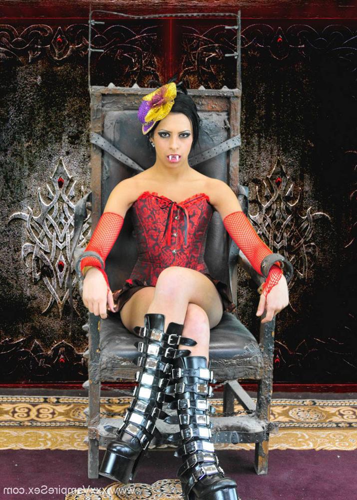 15P Exotic Femdom Vampire Ava Jay biting her minion